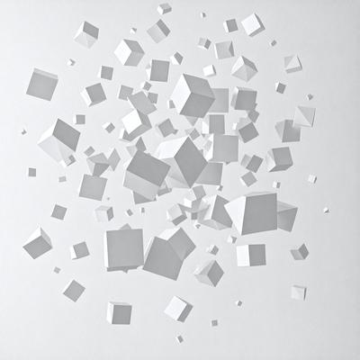 The primary subject of the image is a collection of white cubes, which are scattered across a white background. The setting appears to be a white wall, and the visual style is a combination of digital art and illustration. The dominant colors in the image are white, which creates a clean and minimalist atmosphere.